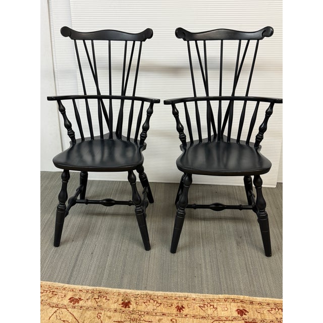 Design Plus Gallery presents a Pair of Vintage Tall-Back Windsor Armchairs from Nichols & Stone. Constructed from wood in...