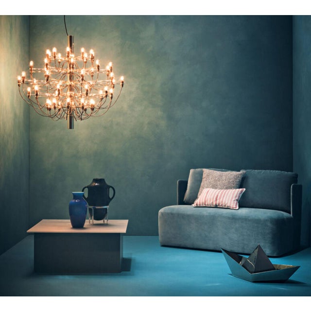 By Flos: Since 1958, this iconic Gino Sarfatti design has served as an ultra-modern representation of the traditional mid-...