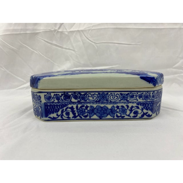 This vintage blue & gray earthenware pottery covered box originates from the British Indian Ocean Territory. Hand painted...
