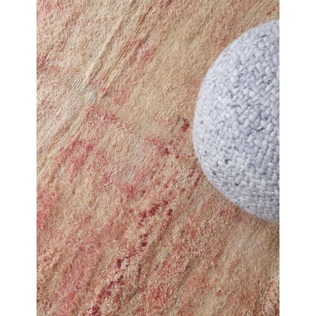 Add warmth and comfort to your space with our 8.6 x 5.9 ft Moroccan Beni MGuild Wool Rug. Its neutral tones create a...