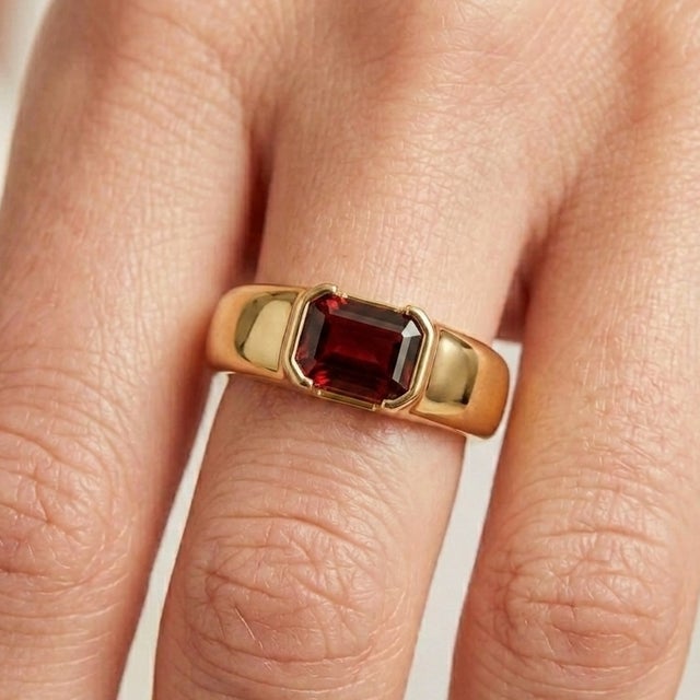 Elevate your look with a seamless balance of clean, industrial geometry and rich, deep crimson tones. This striking...