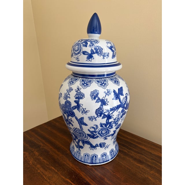 A beautiful large Chinoiserie blue and white porcelain covered ginger jar or temple jar China, Late 20th Century Measures:...