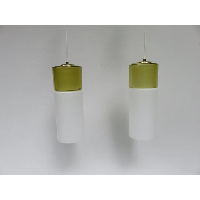 - Pair of 1960s ceiling lights - Model: Elba - Designed and made by Peill & Putzler - Stained glass shades - Shade height:...