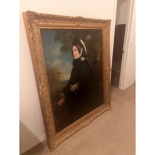This piece is a framed oil painting named "Lady in a Black Coat" by the British artist William Henry Haines (1812-1884)....