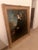This piece is a framed oil painting named "Lady in a Black Coat" by the British artist William Henry Haines (1812-1884)....