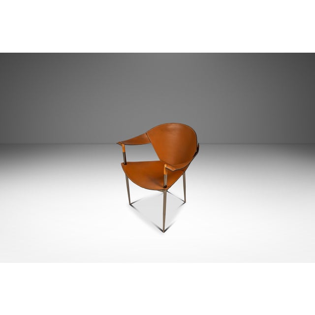 Introducing a rare Italian postmodern 'Jocauro' armchair produced by the lauded luxury furniture makers of Arrben. The...