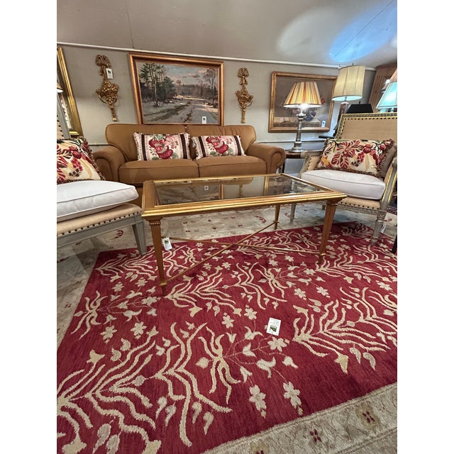Antique gold leaf metal classic Hollywood Regency “Bristol” coffee table by Perigold having streamlined silhouette and...