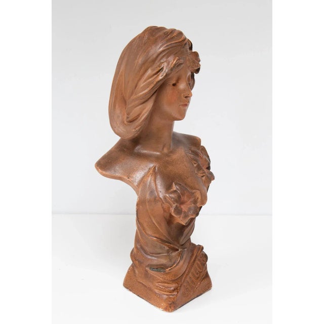 Art Nouveau French Plaster Bust of a Young Woman, 1890s-1910s, in Good conditions. Designed 1890 to 1919
