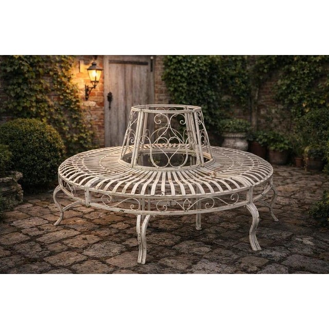 A beautifully decorative circular tree bench designed in the tradition of classic English garden and park furniture....