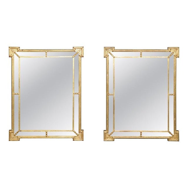 An exceptional and historically significant pair of signed Directoire-style gilt mirrors, made specifically for the New...