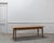 This solid walnut farmhouse table, dating from the 1900s, captivates with its clean lines, beautiful proportions, and the...