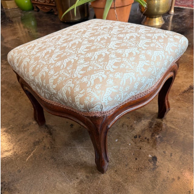 Vintage French style footstool covered in a signature Fortuny fabric