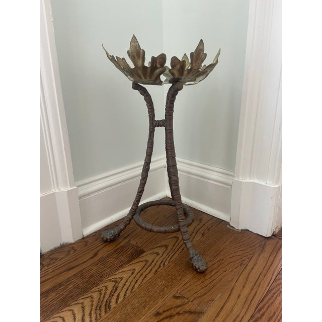 This stunning brass bowl or plant stand has highly detailed faux bamboo designed legs. The events leaf top could hold a...