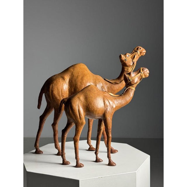 Set of 2 decorative statues of Dromedaries. Fully upholstered in leather. Presumably English, 20th century. Liberty style....