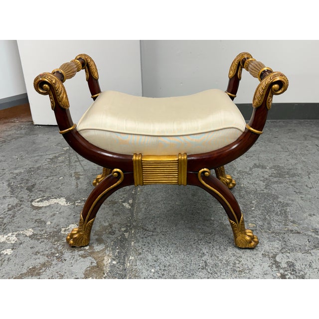 Design Plus Gallery presents a Neoclassical Curule Bench from Maitland-Smith. This decorative bench showcases a sculptural...