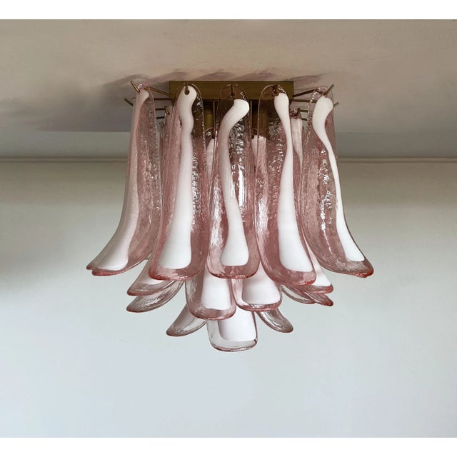 DUTIES FREE A stunning Italian Murano glass ceiling lamp composed of 32 handblown Murano glass petals in an elegant pink...