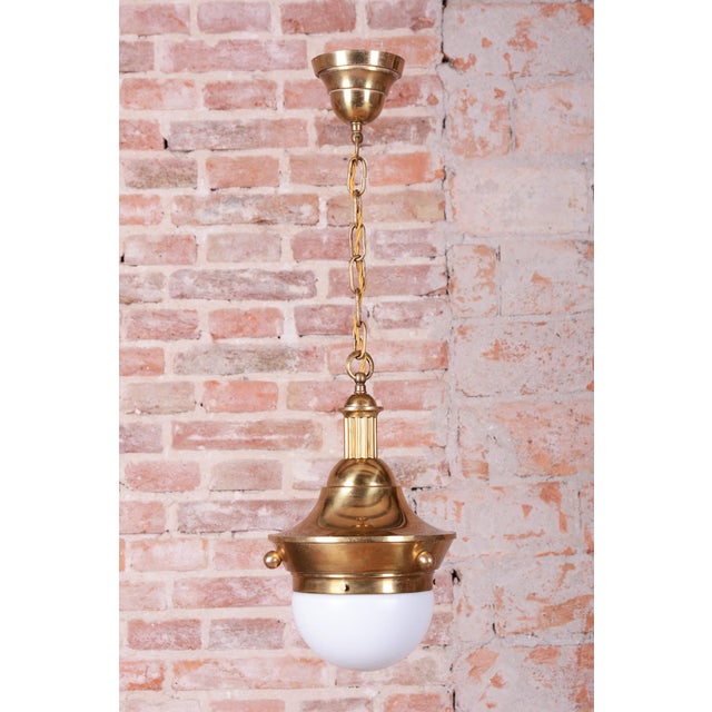 This exceptional chandelier is the work of one of the most prominent German architects and designers, Peter Behrens,...