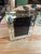 A vintage Italian picture frame crafted from thick clear glass, beautifully decorated with hand-etched floral and foliate...