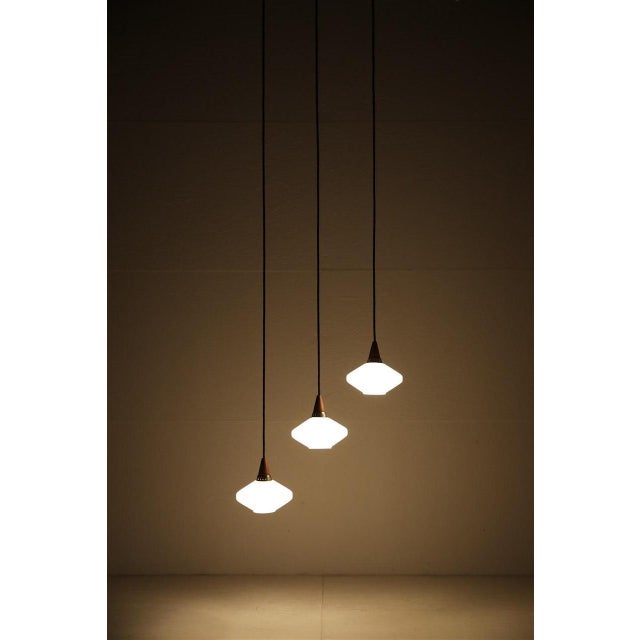 Mid-Century Modern Danish Glass Pendant Lamps with Teak Top, 1960s, Set of 3 For Sale - Image 10 of 11