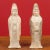 A pair of Qing dynasty 20th century terracotta Chinese hooded priestess sculptures with original paint. Crafted in China...