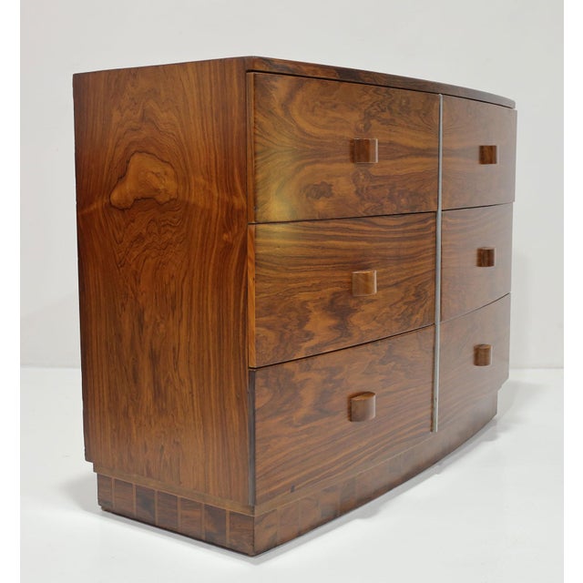 Elevate your space with the Gilbert Rohde #3770 Six-Drawer Dresser, an exquisite piece of history made for Herman Miller....