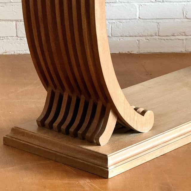A striking mid century console table with unique fluted design originated from Thailand and dates back to the 1980s. Made...