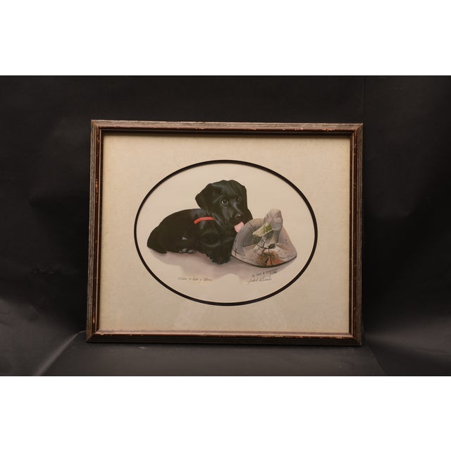 This heartwarming lithograph by Jack Schroeder, titled "First Retrieve," captures the adorable scene of a black Labrador...