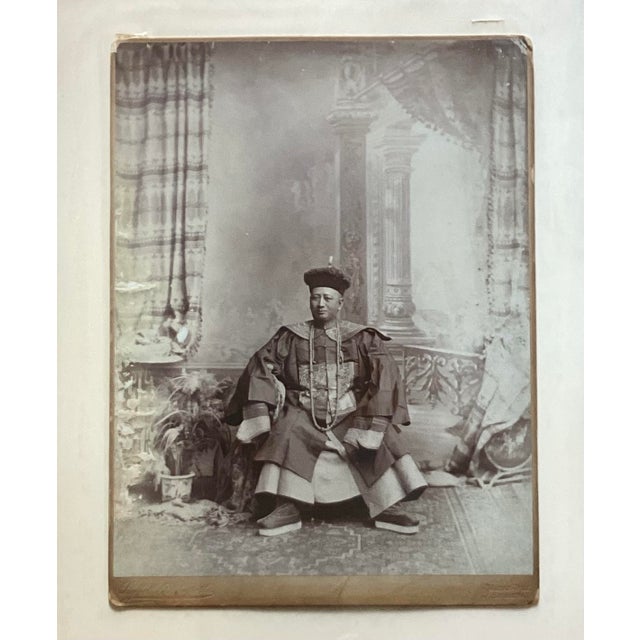 This original antique framed photograph by studio Stafhell & Kleingrothe captures a seated Chinese official in traditional...
