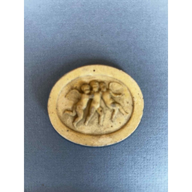 Discover a piece of timeless classical art with this captivating collection of Plaster of Paris intaglios, beautifully...