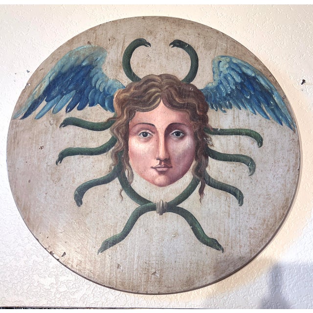 Antique hand-painted Oil on Wood Baroque Wall Hanging Plaque of Winged Medusa. Fine Quality hand painted round wall...