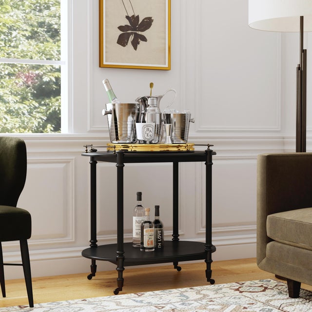 This charming Butler Specialty Company cart can be used as both a bar cart or tea server and is a wonderful addition to...