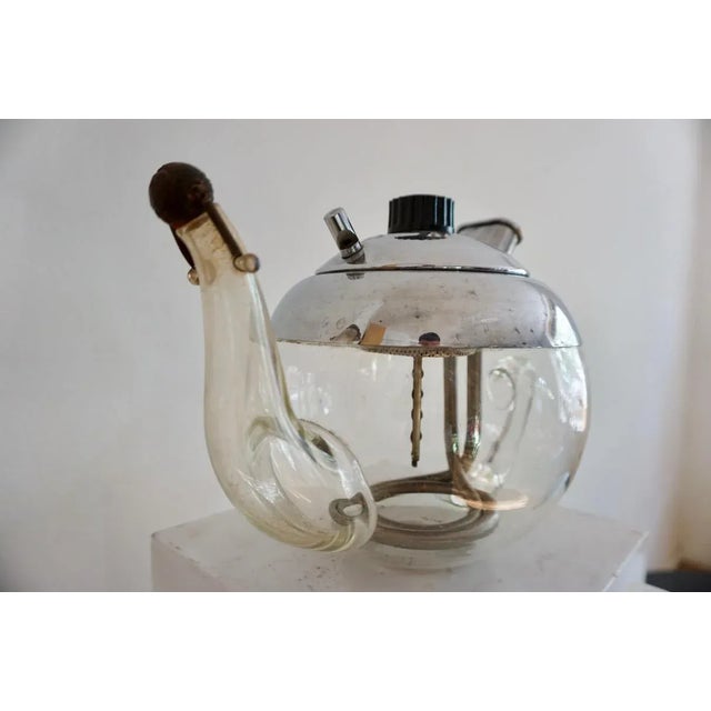 The Mandarin Teapot is an icon of Hungarian design. Manufactured c. 1940 by Elekthermax company in Budapest, the teapot...