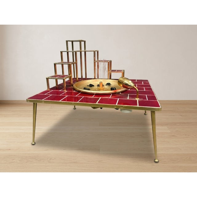 This striking retro home fountain was produced in the late 20th century and features a distinctive geometric design...