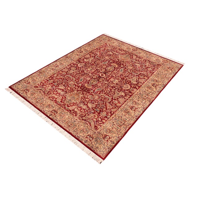 Designed with mesmerizing intricacy and gorgeous color palette, this hand-knotted masterpiece demonstrates the beauty and...