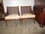 This is a Beautiful Pair of 1940s Regency Style Cane Back Walnut Bergere Chairs that are all Original finish that have...