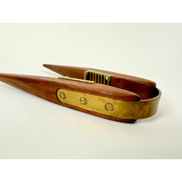 Height in position with the mechanism screwed in. This piece is attributed to the mentioned designer/maker. It has no...