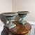 These classical pedestal urn planters feature a lovely aged green finish that gives them an authentic antique French...