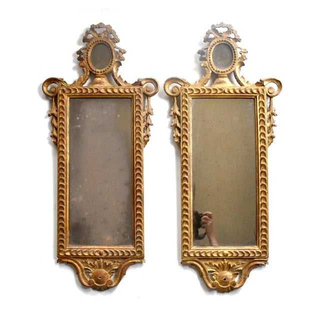 A pair of antique, late 18th-century, c. 1795 girandole wall mirrors from the Piedmontese region of Italy, with a gouged...
