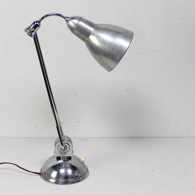 Table Lamp by Charlotte Perriand for Jumo, 1940s, in Very Good conditions. Designed 1920 to 1949 This piece is attributed...
