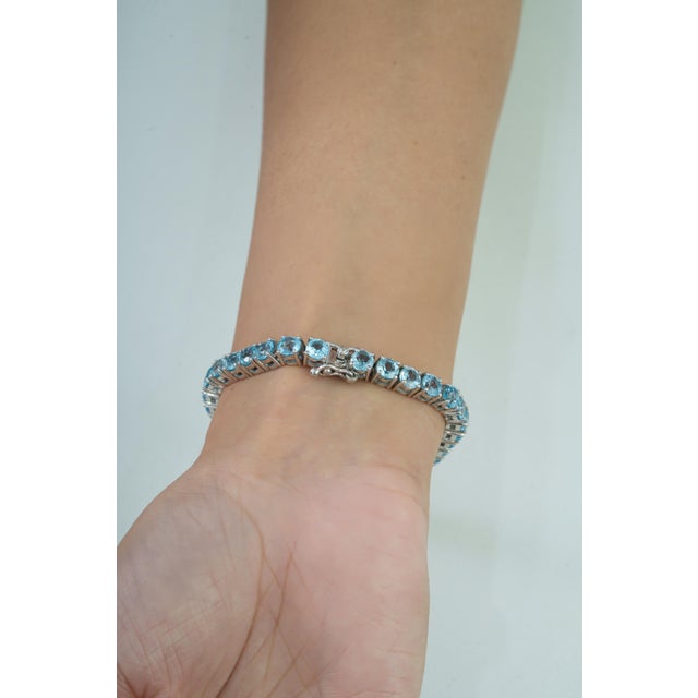 Early 21st Century 20 CTTW Blue Topaz Tennis Bracelet in 925 Sterling Silver 7 Inch For Sale - Image 10 of 13