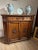 Beautiful poplar wood cabinet, with a walnut top, two doors, and three drawers. Probably from the north-central region,...