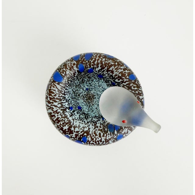 Contemporary art glass sculptural bird by Swedish maker Kosta Boda. Ulrica Hydman-Vallien designed the Cocoo series for...