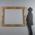 Carved wooden frame from the 18th century, made in Italy. The structure features an outer molding richly decorated with...