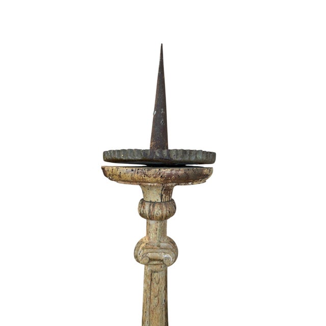 This elegant pair of 19th-century French candlesticks is crafted from wood and features a tall, sculptural silhouette with...