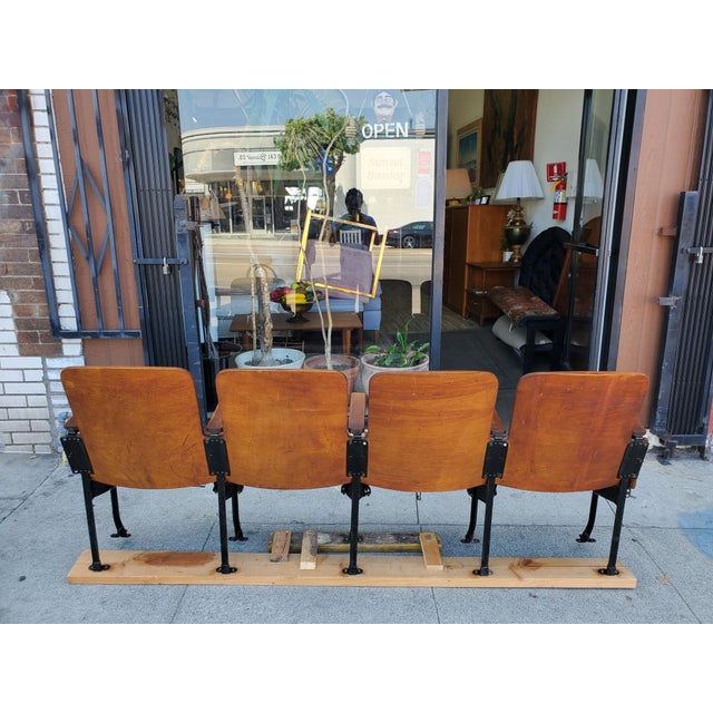 Vintage row of four old theater seats. They all interlock via a metal brackets and are quite comfortable. Each seat can be...