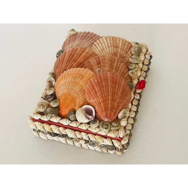 Antique Dailors Valentines tropical sea shells encrusted jewelry box with red velvet inside.