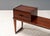 Denmark, ca. 1960s. A scarce and smartly designed console table by Kai Kristiansen for Aksel Kjersgaard. Features rosewood...