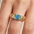 Elevate your look with a seamless balance of clean, industrial geometry and crisp, vibrant ocean tones. This striking...