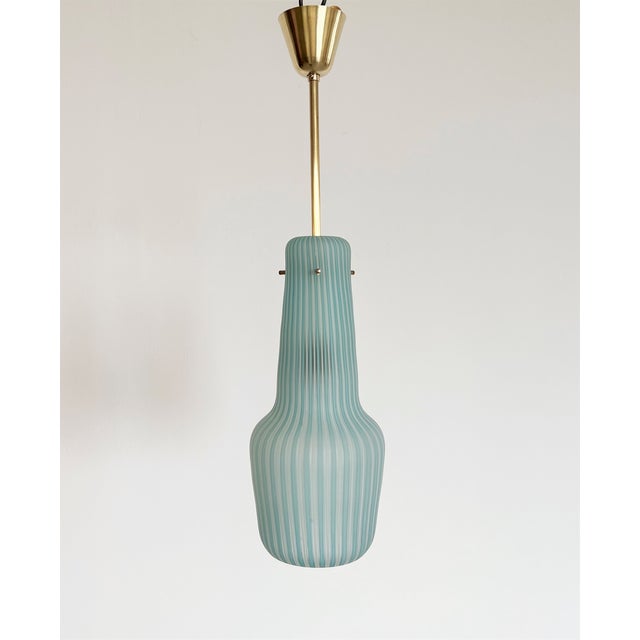 Beautiful small hanging lamp or lantern from Venini glass production in Murano, Italy in the 1950s. The glass is handmade...