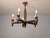 This chandelier reflects the Brutalist sensibility found in French design of the 1940s, carved in the sculptural style...